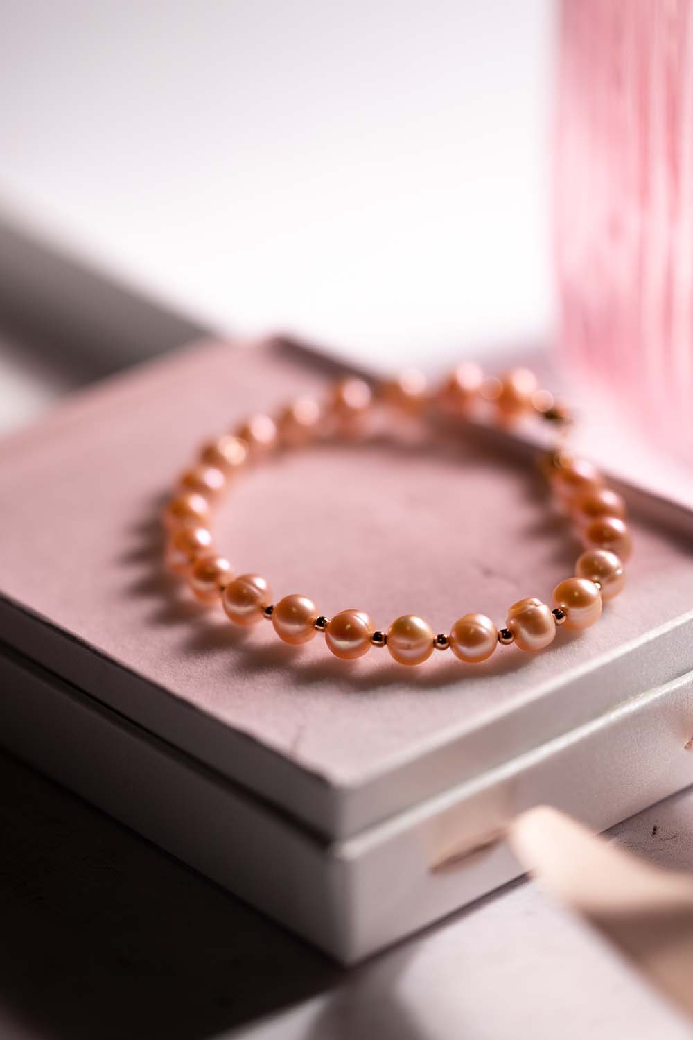 Bransoletka z łososiowych pereł